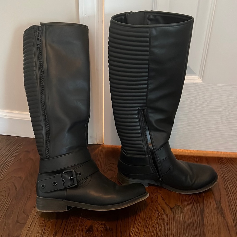 Black tall boots by Aldo